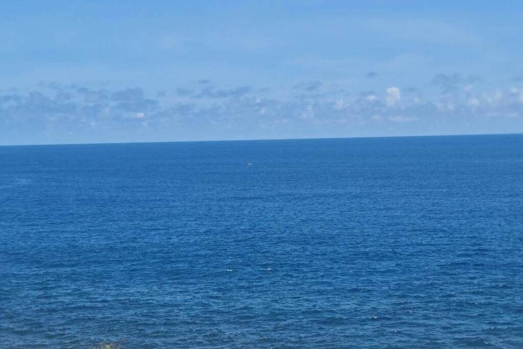 Ocean Mirror Apartment Praia Bagian luar foto