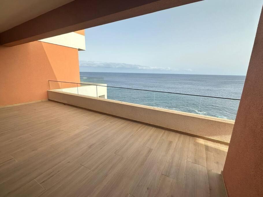 Ocean Mirror Apartment Praia Bagian luar foto