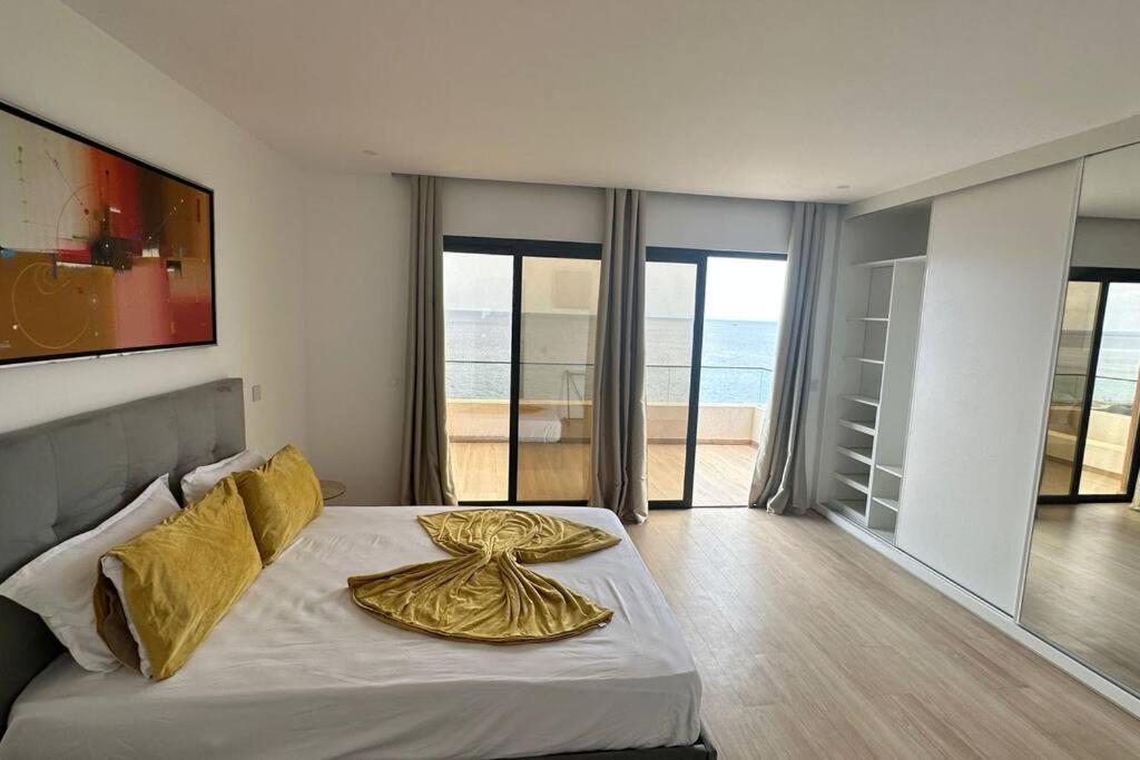 Ocean Mirror Apartment Praia Bagian luar foto