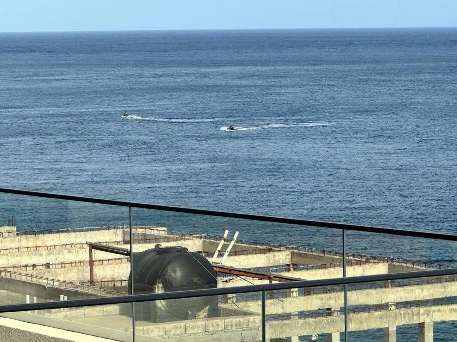 Ocean Mirror Apartment Praia Bagian luar foto