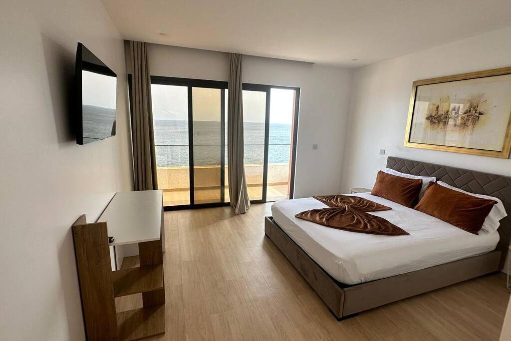 Ocean Mirror Apartment Praia Bagian luar foto