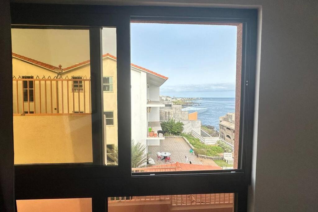 Ocean Mirror Apartment Praia Bagian luar foto