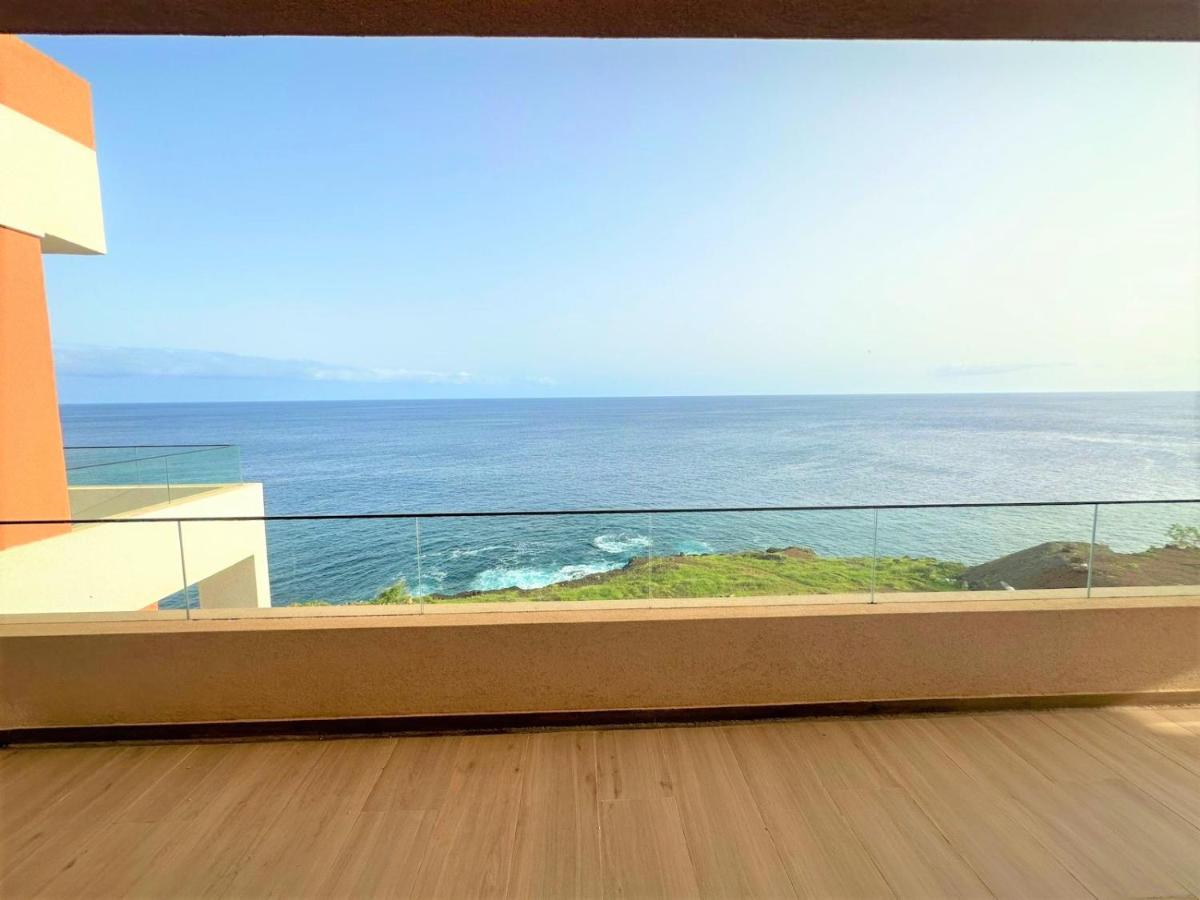 Ocean Mirror Apartment Praia Bagian luar foto