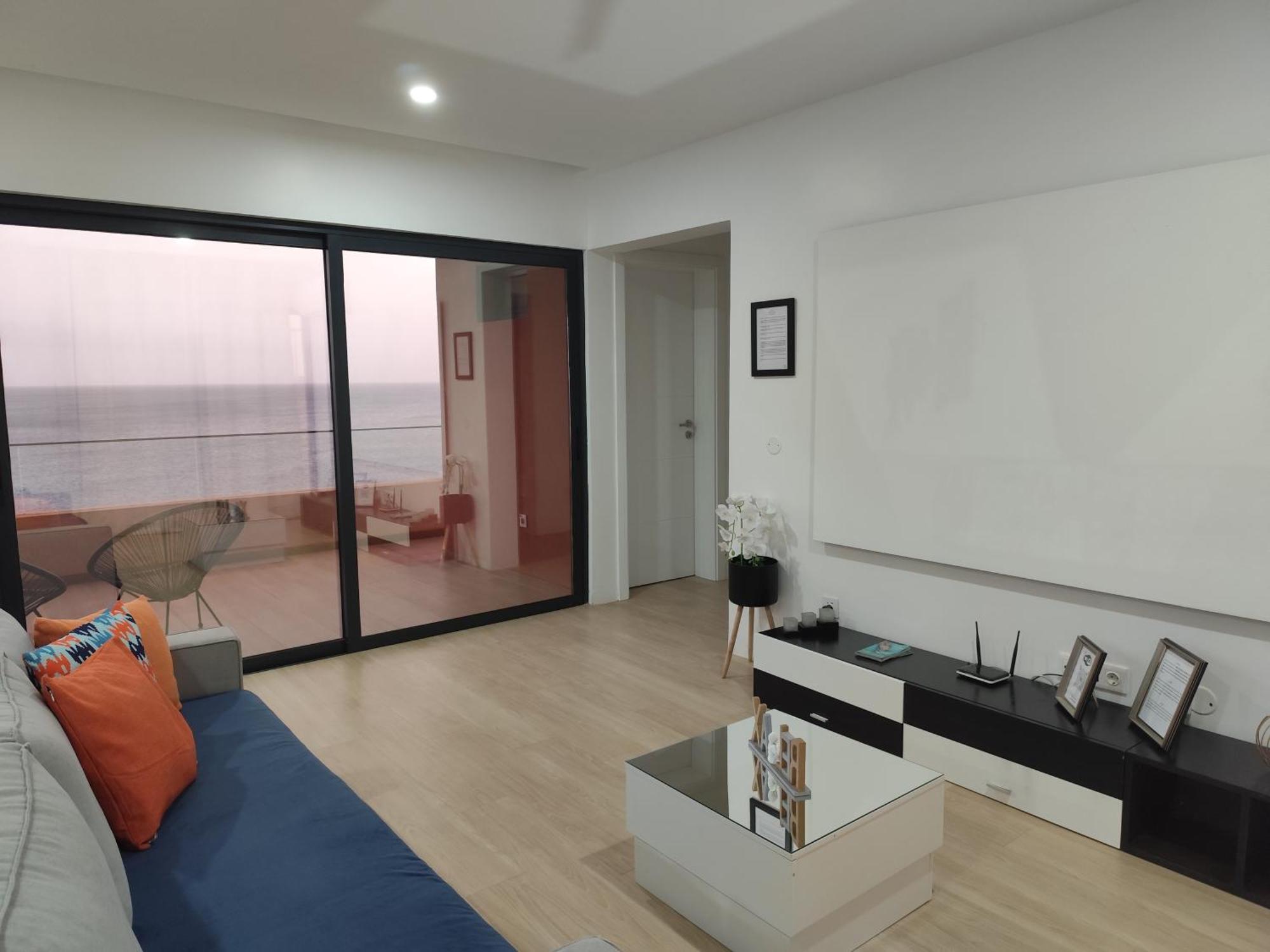 Ocean Mirror Apartment Praia Bagian luar foto